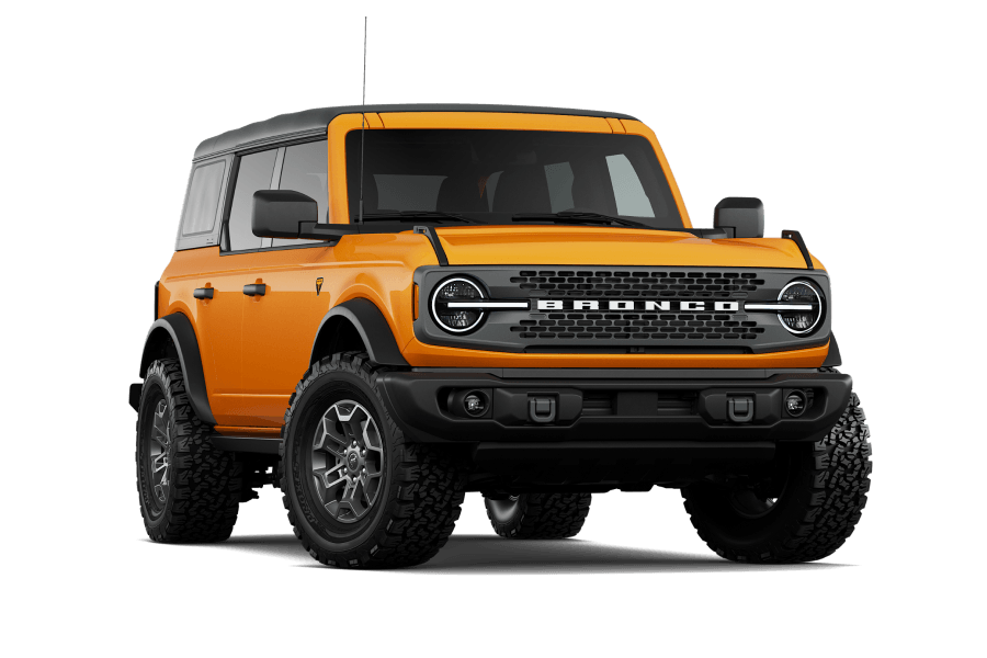 2026 Ford Bronco Badlands in Orange Fury Metallic, front three-quarter studio view.