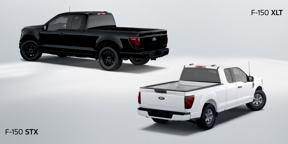 Man using power saw on the back of Ford Pickup Truck